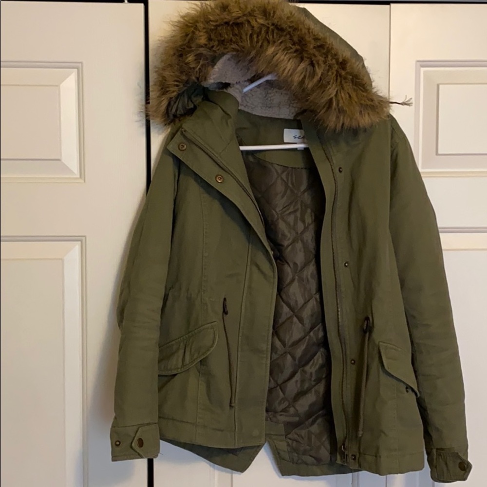 Green utility jacket with detachable fur trim